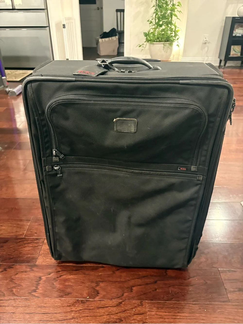 Tumi Black Men’s Rolling Carry-On Travel Bag